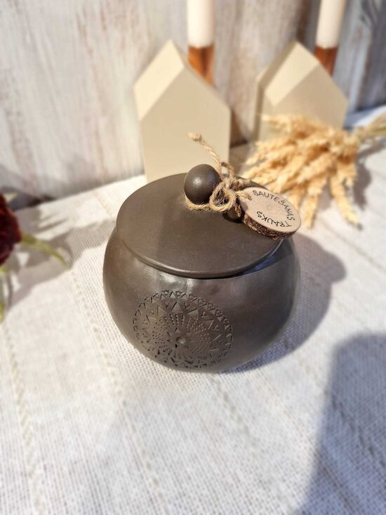 Sautēšanas trauks ar saulītes rakstu zīmi